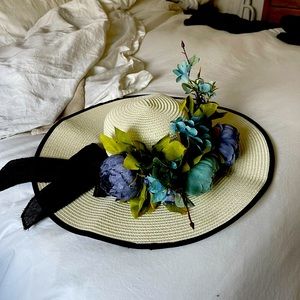 Custom made hat with decorative flowers